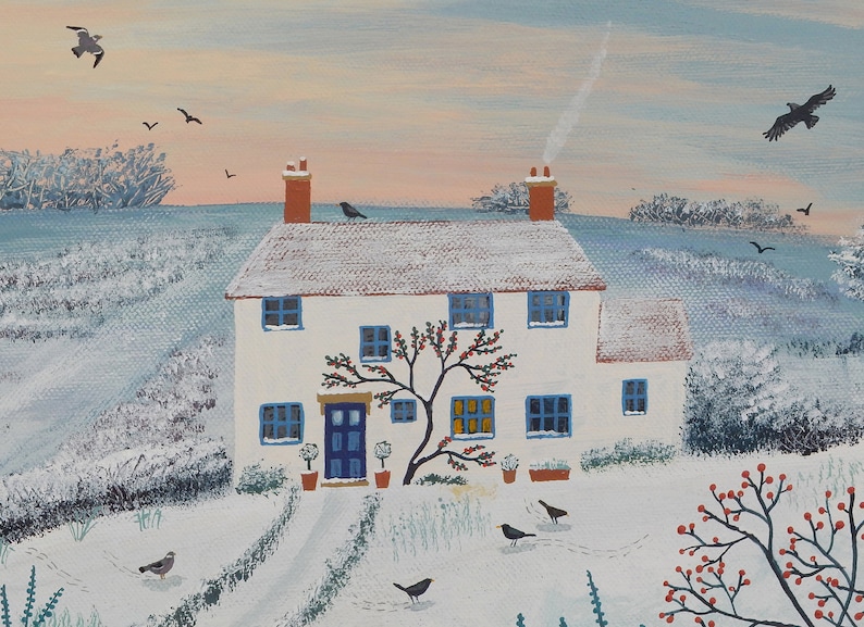May include: A white cottage with a blue door and snow-covered roof sits in a snowy landscape. A red-berried tree grows in front of the house. Several black birds are perched on the roof and flying in the sky.