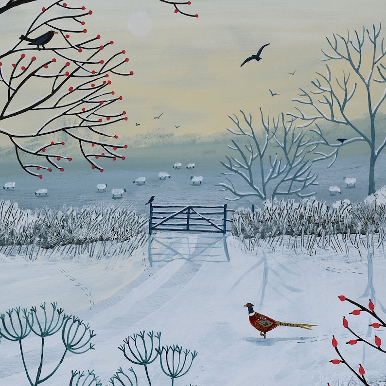 May include: A winter scene with a snowy field, a wooden gate, and a pheasant standing in the snow. The background features a bare tree with red berries and a flock of sheep in the distance.