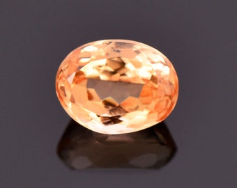 SALE! Stunning Bright Orange Imperial Topaz Gemstone, 1.12 cts., 6.4x4.9 mm., Oval Shape