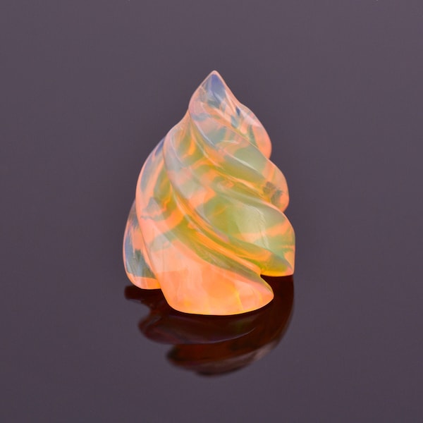 Lovely Hand Carved Orange Opal from Ethiopia 4.23 cts