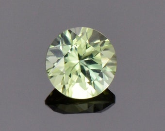 Bright Yellow Green Sapphire from Australia, 0.50 cts., 5 mm., Round Brilliant Cut