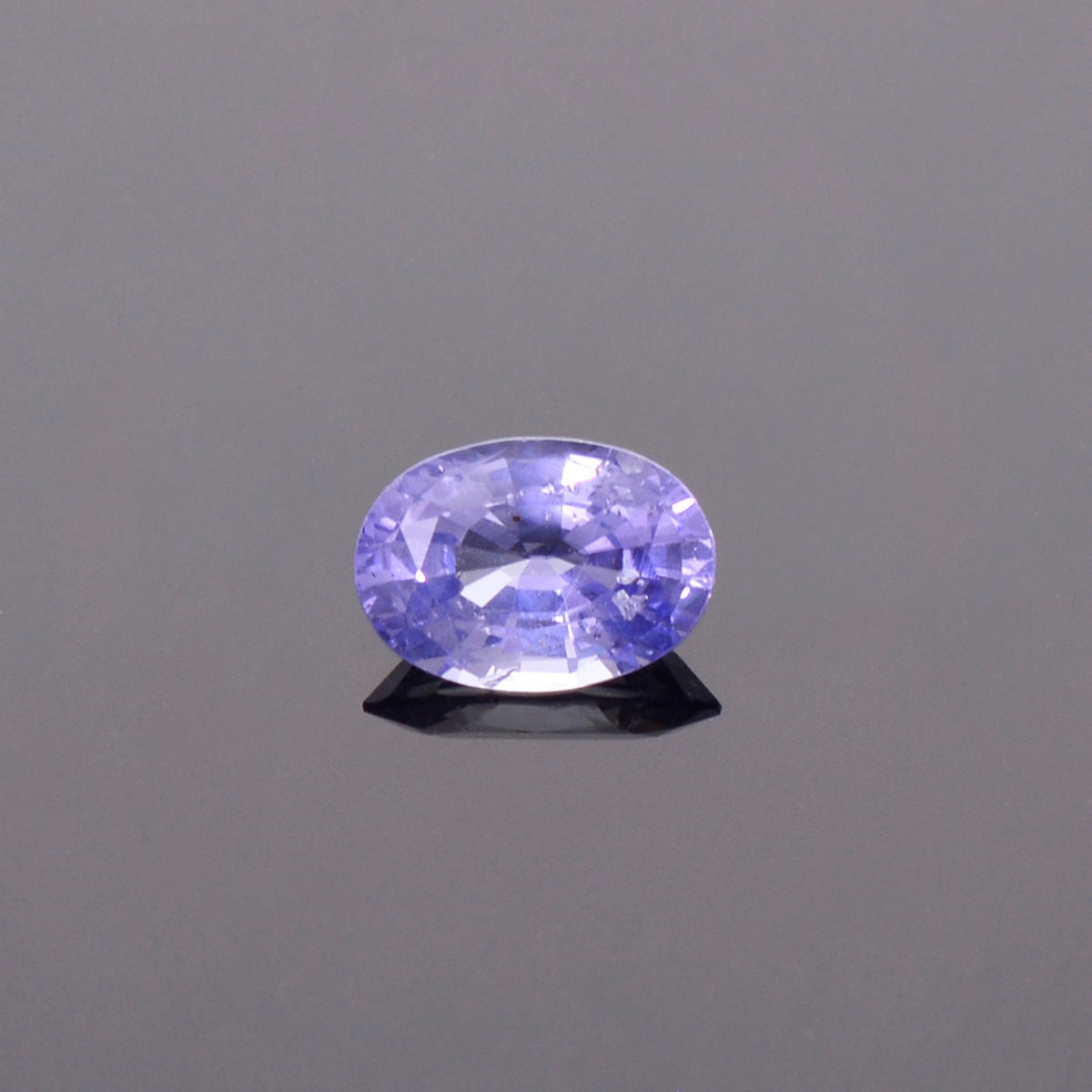 Unique Blue Sapphire Gemstone With Negative Crystal Inclusions 125