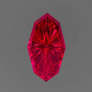May include: A faceted, elongated gemstone in a vibrant shade of red. The gem's surface is intricately cut, creating a starburst pattern that reflects light. The gem is set against a gray background.