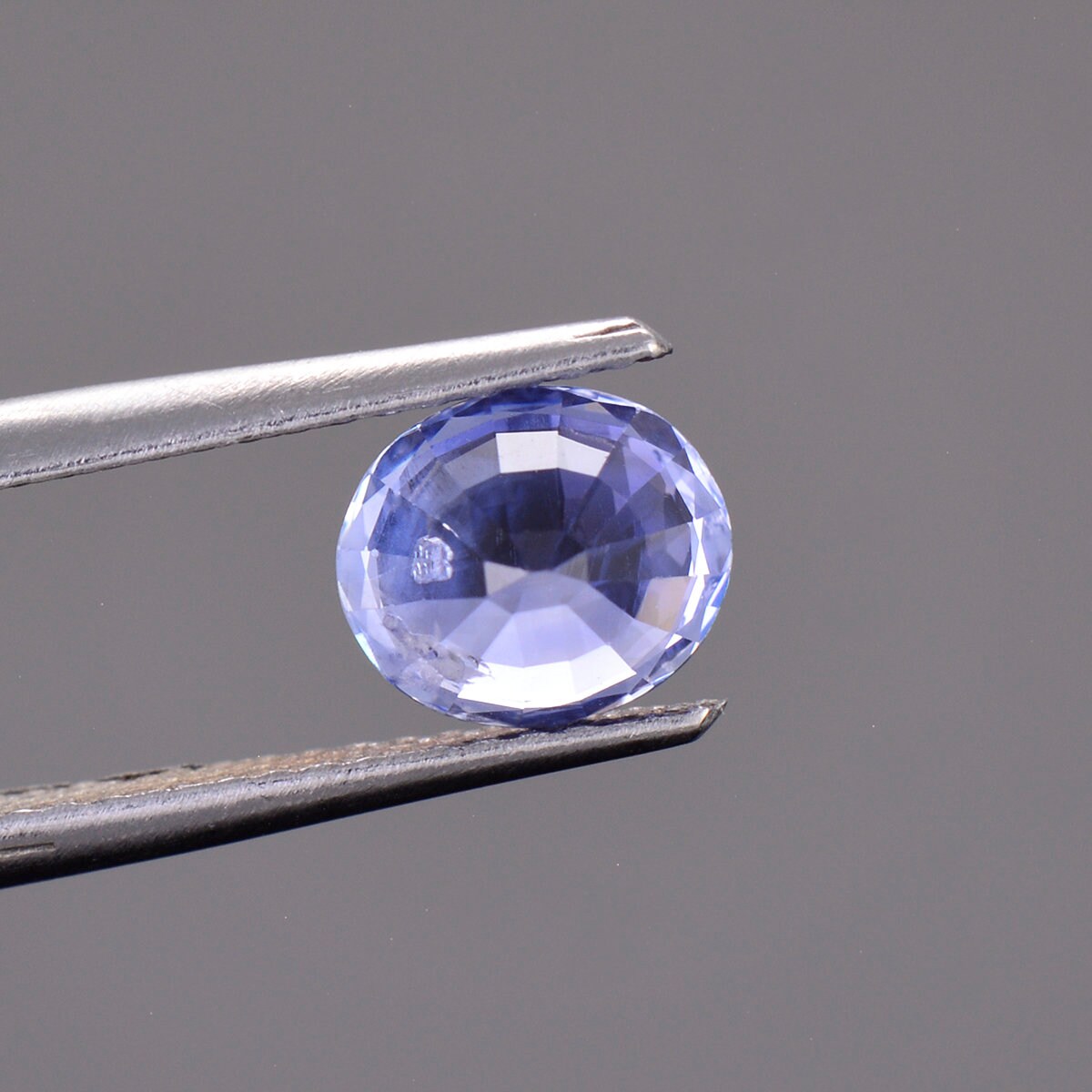 Fascinating Blue Sapphire Gemstone With Negative Crystal Inclusion 1