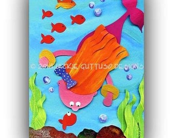 May include: A colorful paper craft illustration of a mermaid with orange hair, a pink tail, and a blue bow. The mermaid is swimming underwater with red and orange fish. The background is a blue and green watercolor wash.