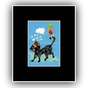 May include: A black cat with white spots walks through a blue rainstorm. A small bird with a yellow umbrella sits on the cat's back. The text "Jackie Gutuso" is in the lower right corner of the image.