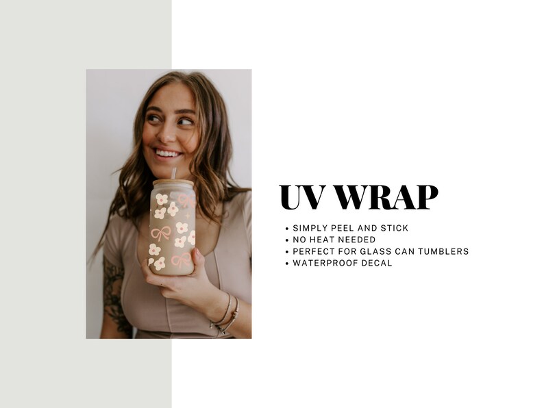 May include: A clear glass can tumbler with a bamboo lid and straw, decorated with a UV wrap featuring a pattern of pink bows and cream-colored flowers. The text "UV WRAP" is displayed.