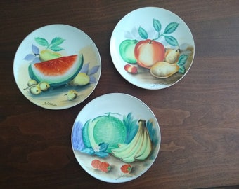 Set of three hand painted Japanese plates by artist Hitomi.