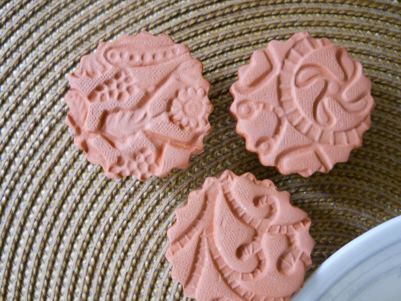 Set of 4 ceramic cookie stamps each embossed with a unique Etsy