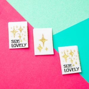 Size inclusive sew in labels for handmade or homemade items. Reads "Size: Lovely" with gold stars on it.