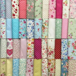 May include: A collection of 36 fabric squares featuring various floral and polka dot patterns in shades of pink, blue, green, and yellow. The fabric squares are arranged in rows and are perfect for quilting, crafting, or other sewing projects.