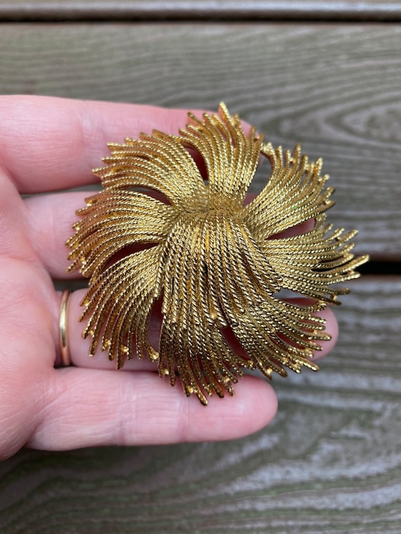 Vintage monet best sale brooch
