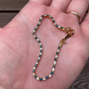 Vintage Schmuck signiert Avon Schöne zierliche blaue und weiße Strass Tennis Armband