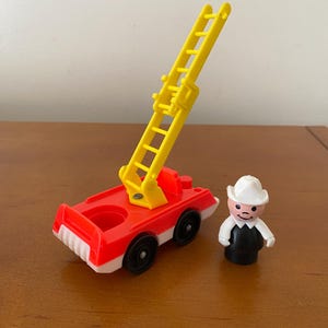 Vintage Fisher-Price Little People Fireman with Fire Truck