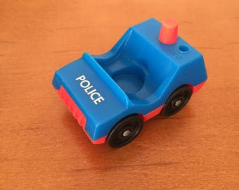 Coche de policía vintage Little People de Fisher-Price
