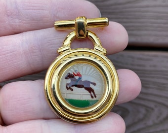 Aigner brooch discount