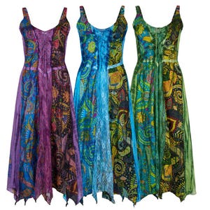 May include: Three patterned dresses with adjustable straps and a V-neck. The dresses feature paisley and floral designs in purple, blue, and green. The dresses have a flowing, asymmetrical hemline, ideal for a bohemian style. The dresses are made of a lightweight fabric.
