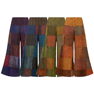 May include: Five pairs of wide-leg patchwork trousers in a variety of colours. The trousers are made from squares of fabric in shades of purple, blue, green, orange, and brown. The trousers are displayed against a white background.