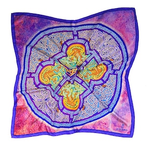 May include: A purple silk scarf featuring a colourful Celtic knot design. The knotwork is in shades of blue, green, yellow, and orange. The scarf has a pink and purple background.