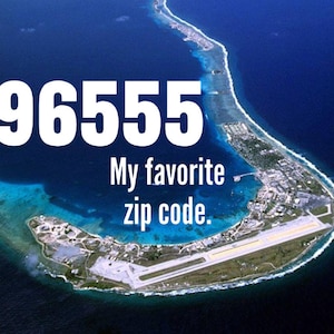 May include: An aerial view of a small island with a runway and the text "96555 My favorite zip code."