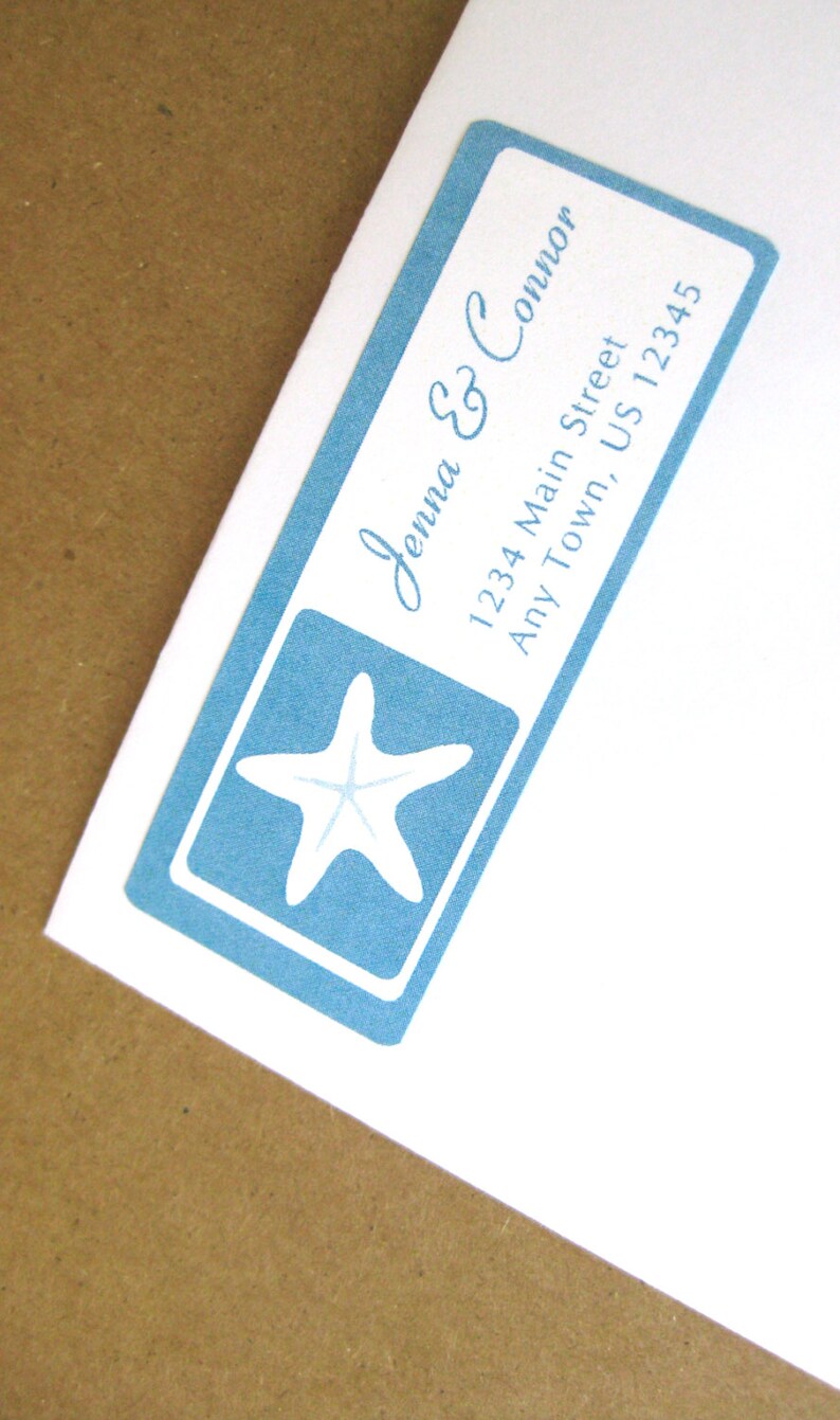 May include: A blue and white return address label with a starfish design. The label reads "Jenna & Connor, 1234 Main Street, Any Town, US 12345".