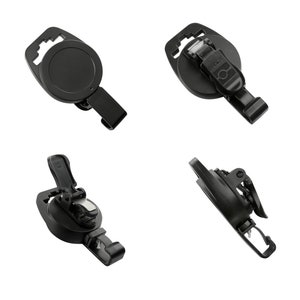 May include: A set of four black retractable badge holders. Each holder features a round disc, a belt clip, and a retractable cord. The holders are made of durable plastic and are designed for attaching to clothing or bags.