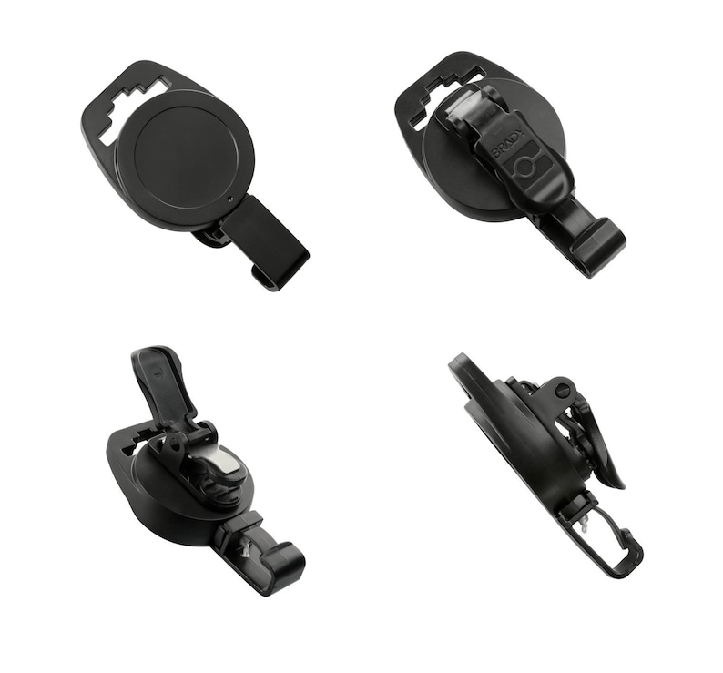 May include: A set of four black retractable badge holders. Each holder features a round disc, a belt clip, and a retractable cord. The holders are made of durable plastic and are designed for attaching to clothing or bags.