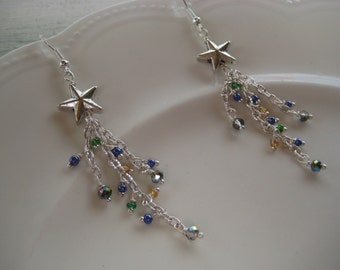 Star earrings on silver ear wires