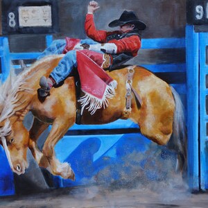 May include: An oil painting depicts a rodeo scene with a cowboy riding a bucking bronco. The cowboy wears a red jacket, black hat, and blue jeans. The horse is a light brown color with a flowing mane. The background features blue fencing and scoreboards.