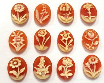 12 Vintage Japan Assorted Flower 10x8mm. Oval Carnelian Resin Cabochon Cameos 403