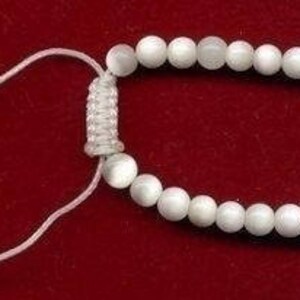 1 Vintage vitt kattögaglas runt pärlhalsband med justerbart glas 600