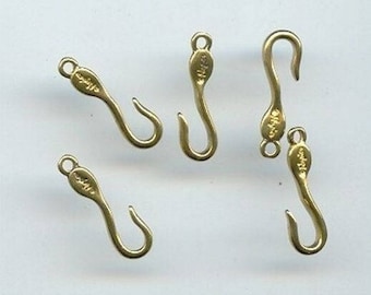 May include: Five gold-toned metal hooks with a small loop at the top and a hook at the bottom. The hooks are all the same size and shape.