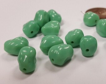 24 Vintage West German Glass Green Turquoise 11X9mm. Oval Baroque Nugget Beads 4720