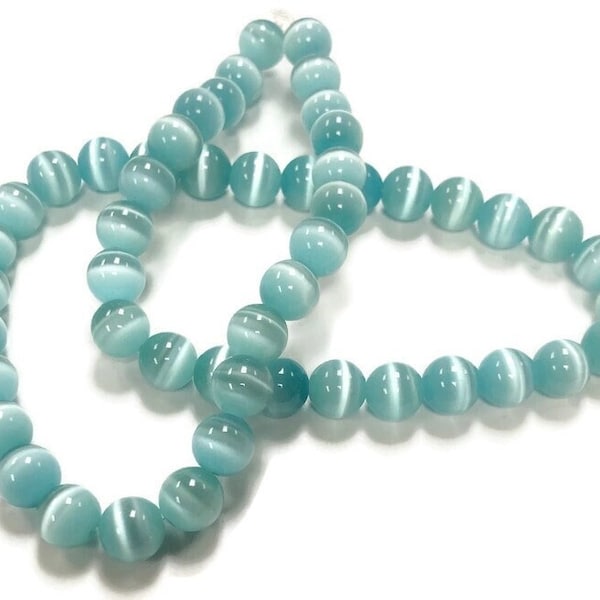 50 Cat's Eye Fiber Optic Glass Sea Foam Green 8mm. Smooth Round Beads 2571