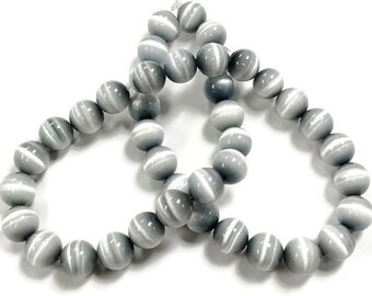 38 Katzenaugen Fiber Optic Grey Glass 10mm. Glatte runde Perlen CH86