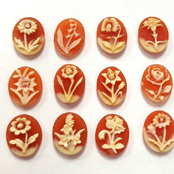 12 Vintage Japan Assorted Flower 10x8mm. Oval Carnelian Resin Cabochon Cameos 403