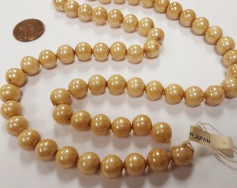 thumbnail image 2 of 50 Vintage Cherry Brand Glass Beads – Japan – Cream Color 9.5mm To 10mm Round – NOS 4706 2 of 3