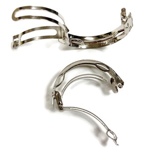 May include: Two silver hair clips with a curved design. The clips are made of metal and have a smooth finish.