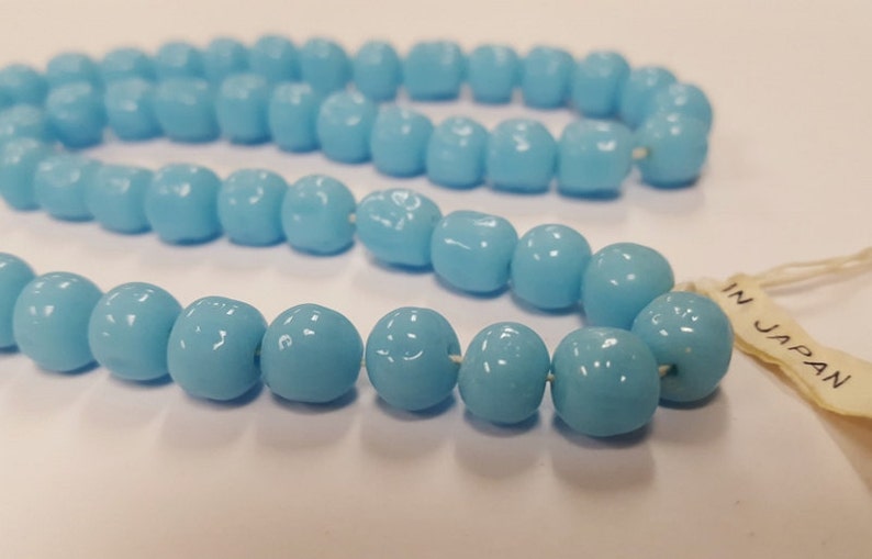 50 Vintage Japanese Cherry Brand Glass Light Blue Turquoise 8mm. 50 Vintage Japanese Cherry Brand Glass Light Blue Turquoise 8mm.