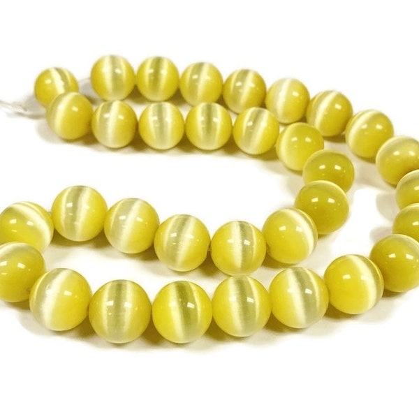 30 Cat's Eye Fiber Optic Glass Yellow 12mm. Smooth Round Beads 2625