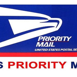 May include: A blue and red USPS Priority Mail label with a white eagle graphic and the text "PRIORITY MAIL" and "UNITED STATES POSTAL SERVICE".