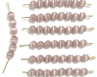 50 Katzenaugen Fiber Optic Glas Flieder 8mm. Glatte runde Perlen CH186