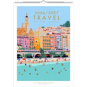May include: A 2026/2027 travel mid-year calendar featuring a colourful illustration of a coastal town with pastel buildings, a tall tower, a sandy beach with umbrellas, and people swimming in turquoise water. The text reads 2026/2027 TRAVEL MID YEAR CALENDAR.
