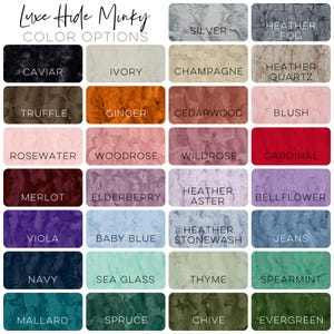 May include: Colour chart displaying 24 different colours for Luxe Hide Minky fabric. Colours include: Caviar, Ivory, Champagne, Heather Quartz, Truffle, Ginger, Cedarwood, Blush, Rosewater, Woodrose, Wildrose, Cardinal, Merlot, Elderberry, Heather Aster, Bellflower, Viola, Baby Blue, Heather Stonewash, Jeans, Navy, Sea Glass, Thyme, Spearmint, Mallard, Spruce, Chive, Evergreen.