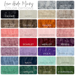 May include: Color chart showing 24 different color options for Luxe Hide Minky fabric. Colors include: Silver, Heather Fog, Caviar, Ivory, Champagne, Heather Quartz, Heather Frappe, Truffle, Ginger, Cedarwood, Rose Quartz, Blush, Rosewater, Woodrose, Wildrose, Scarlet, Merlot, Berry, Elderberry, Bellflower, Viola, Baby Blue, Jeans, Navy, Sea Glass, Thyme, Spearmint, Spruce, Chive, and Evergreen.