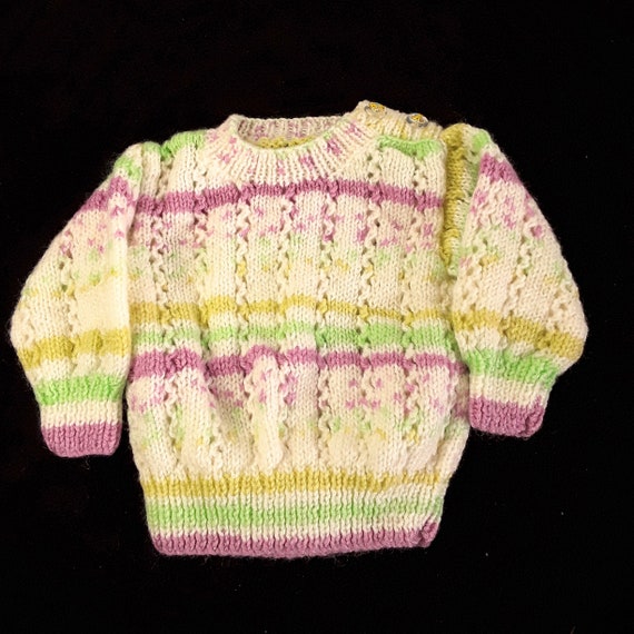 green baby jumper