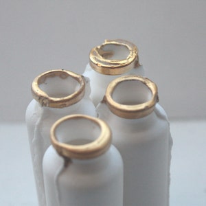 Small white bottle with gold finish from bone china. image 3