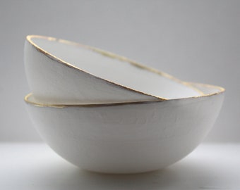 English fine bone china stoneware bowl with mat gold rims.