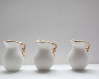 Mini jug made from English fine bone china and real gold rim and handle in stoneware