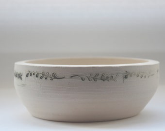 Stoneware vessel handthrown with embossed branches in ivory color